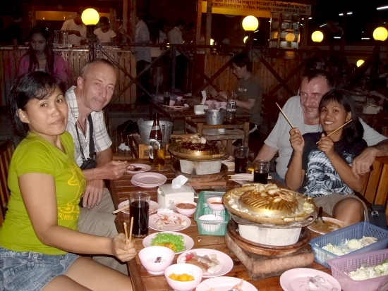 with our friends at a all you can eat in bangkok.JPG